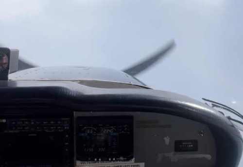 pilot asks a question while flying in his airplane